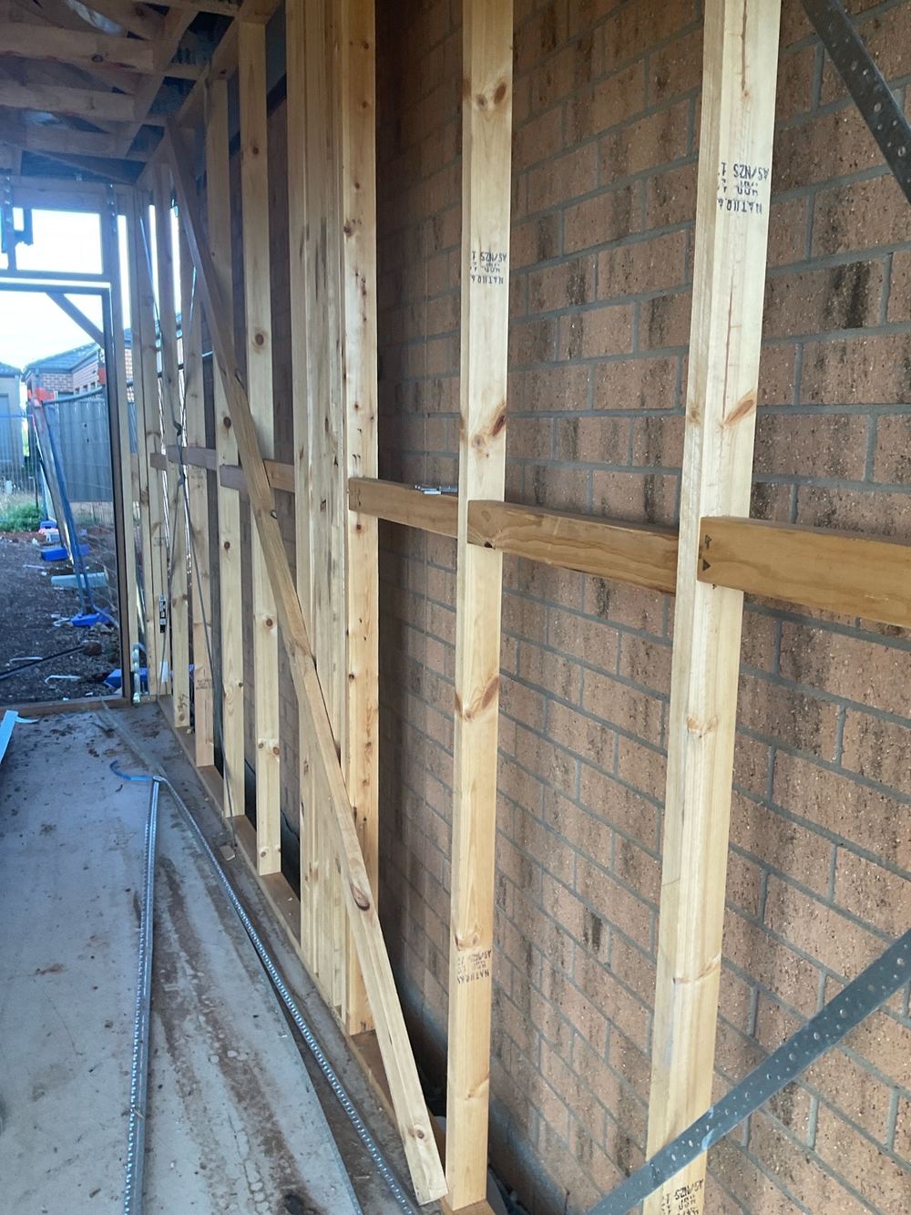 Garage boundary wall built in 70mm timber where the plans show 90mm, Strathtulloh