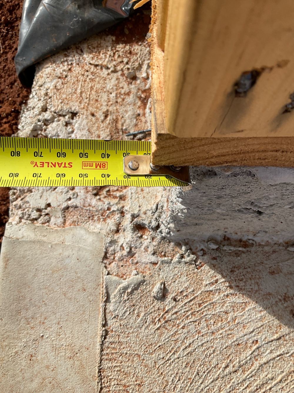 Bottom plate hanging more than 10mm past the slab edge, weakening its bearing, Strathtulloh