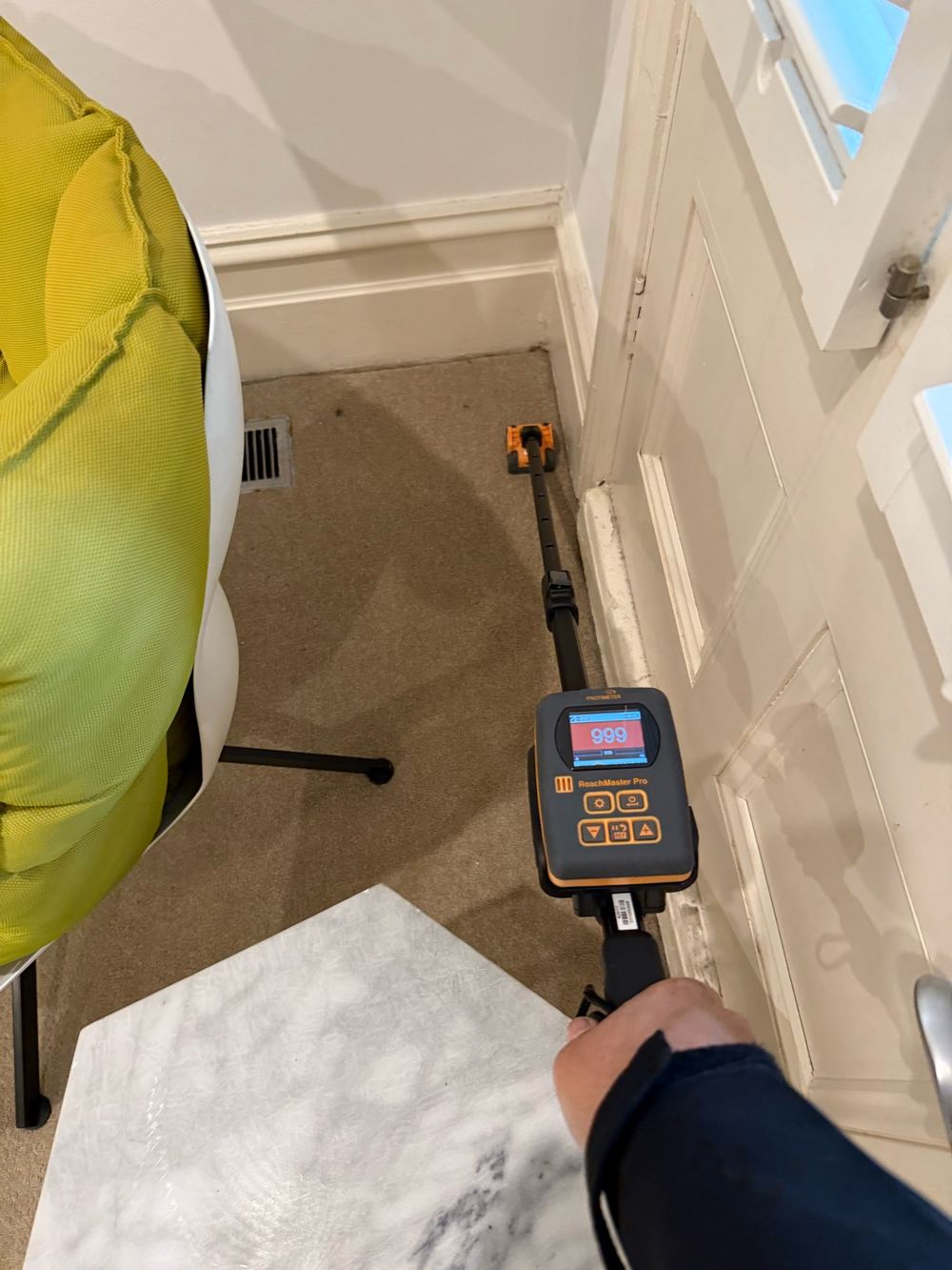 High moisture readings in a living room wall from rising damp, Hawthorn, Strathtulloh
