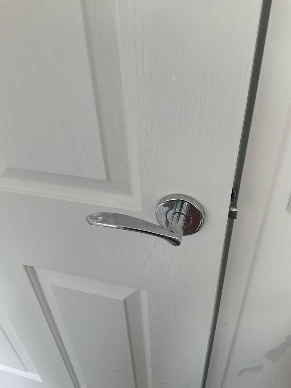 Door latch and strike plate out of line so it will not catch, found during a pre-purchase inspection in Lara
