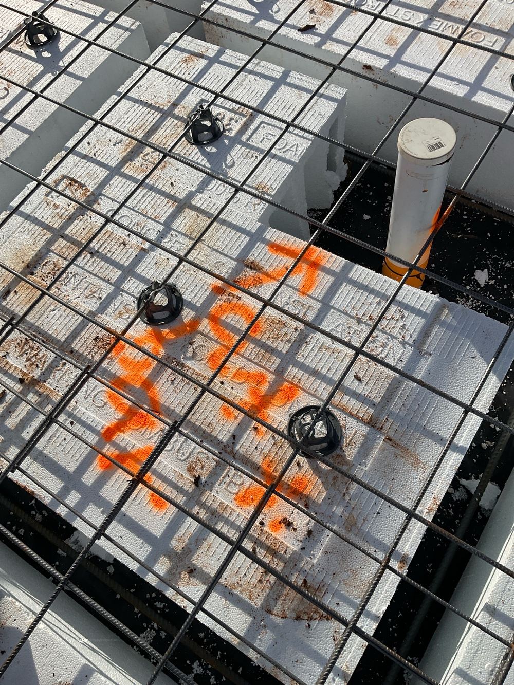 Mesh touching service pipes where a 25mm gap is needed, Strathtulloh