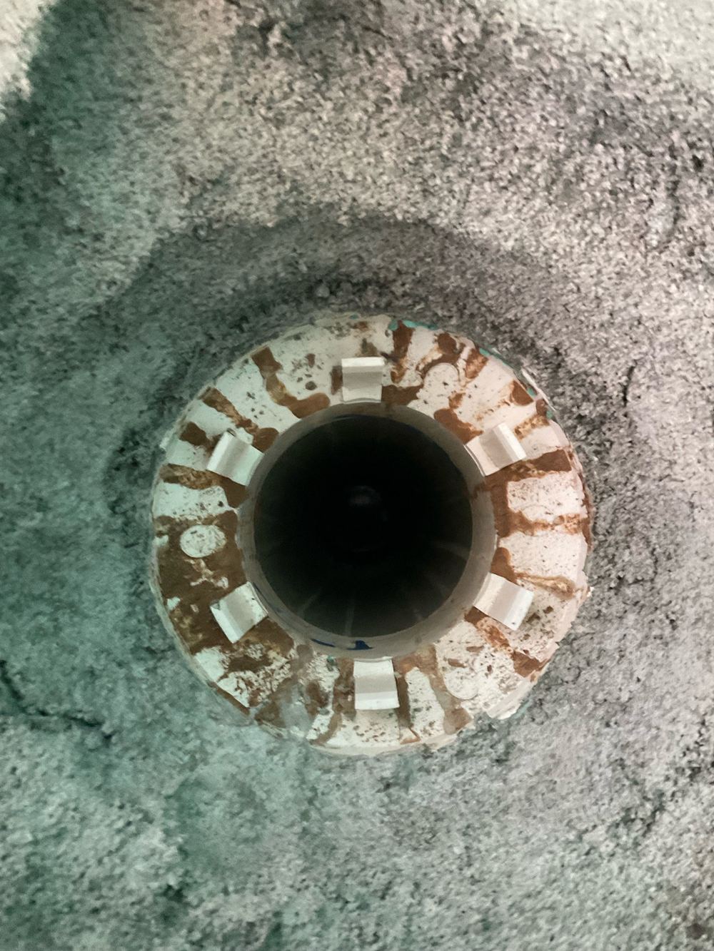 Membrane not taken into the drainage flange, so water can bypass the waste, found during a waterproofing inspection in Strathtulloh